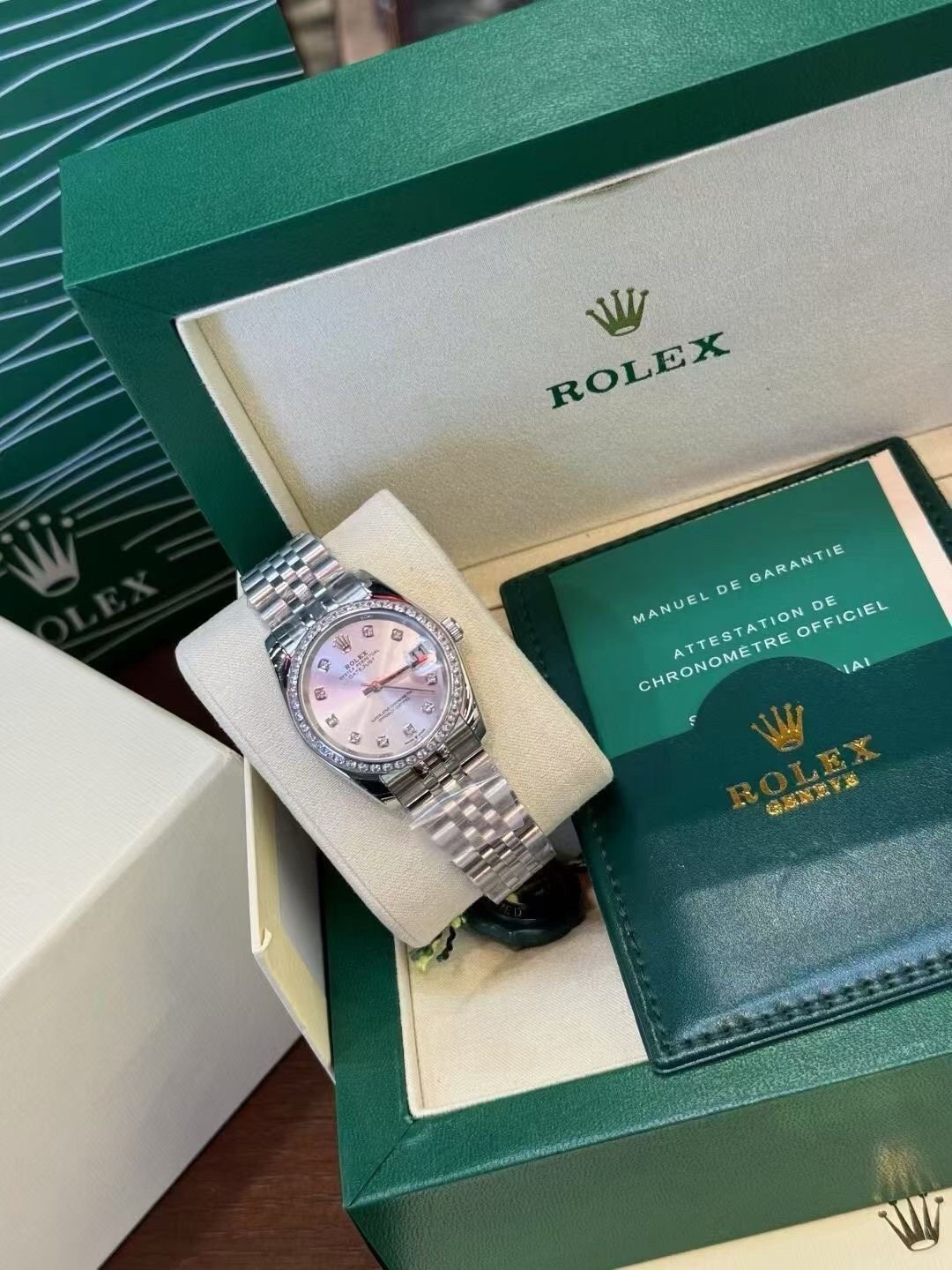 Rolex Pale Iridescent Dial Metal Bracelet Watch — front
