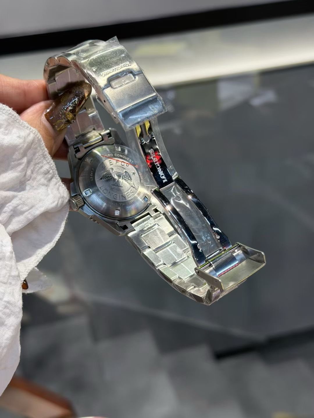 Longines Blue Bezel Link Bracelet Watch — back