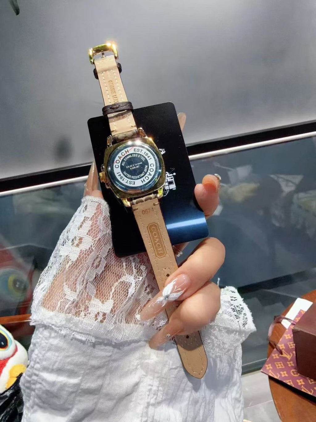 Coach Gold-Tone Patterned Strap Watch — front